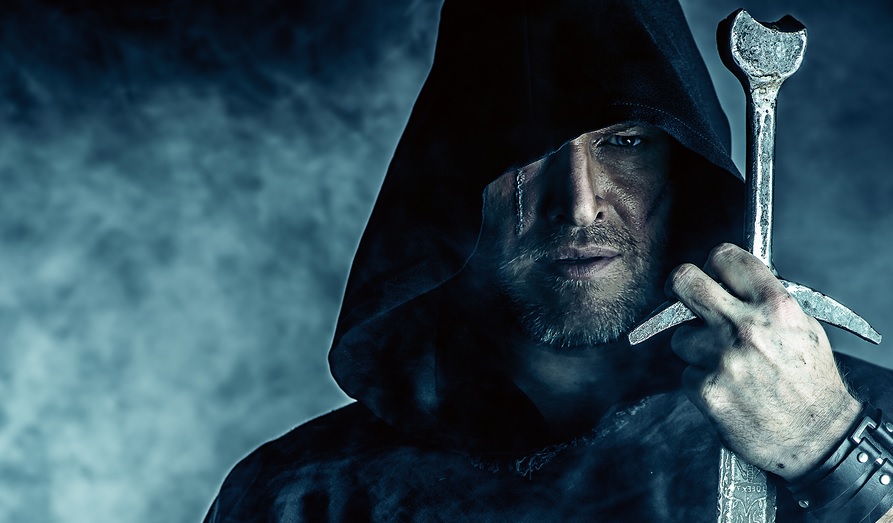 Invisible Battles: The Quest for Hope video game marketing image. Hooded man holding sword.